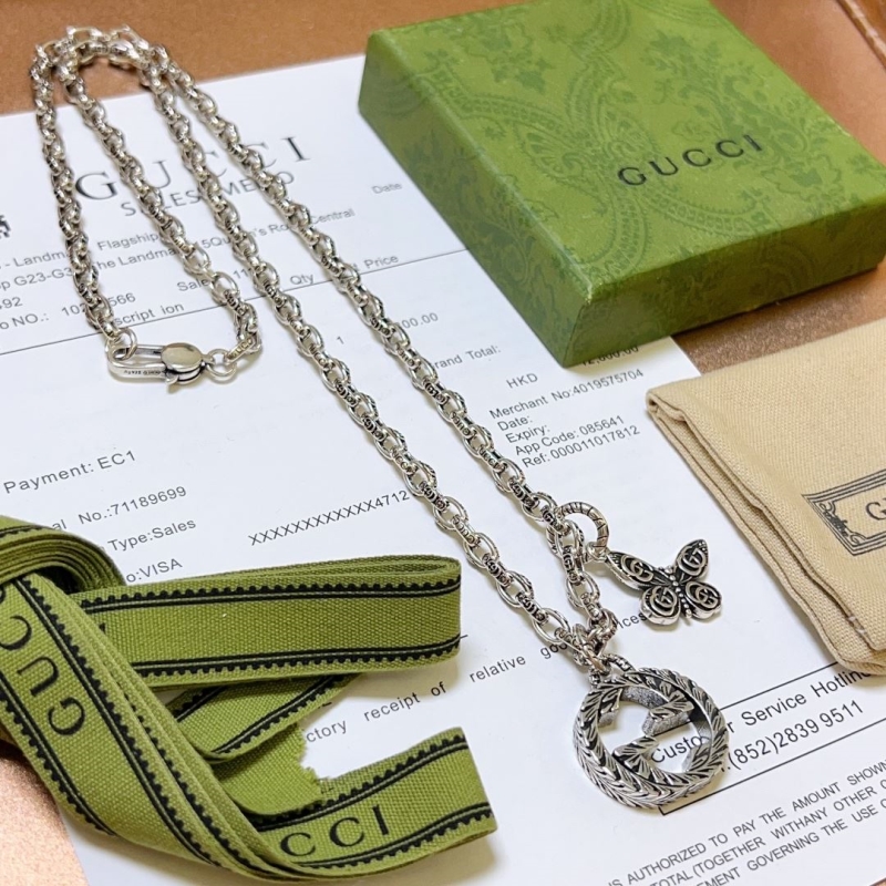 G*u*i necklaces